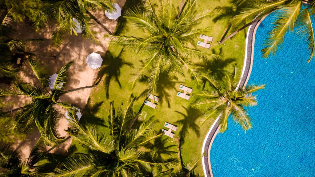 outrigger-khao-lak-beach-resort-pool-aerial-5