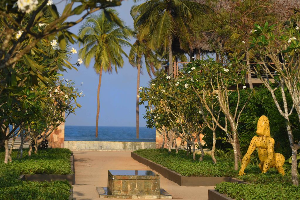 Karpaha-Sands-Kalkudah-garden-and-gorialla-sculpture-frangipani-beach